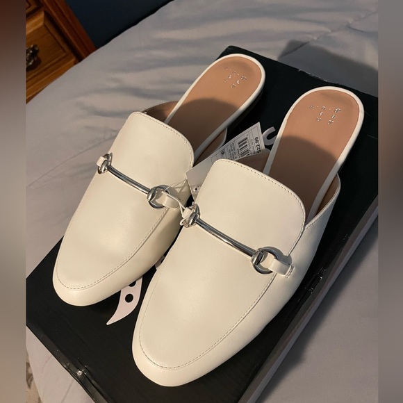 a new day Shoes - A NEW DAY white loafer slip ons with silver chain, NWT, size 10